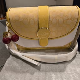 Beautiful COACH with Cherry Charm