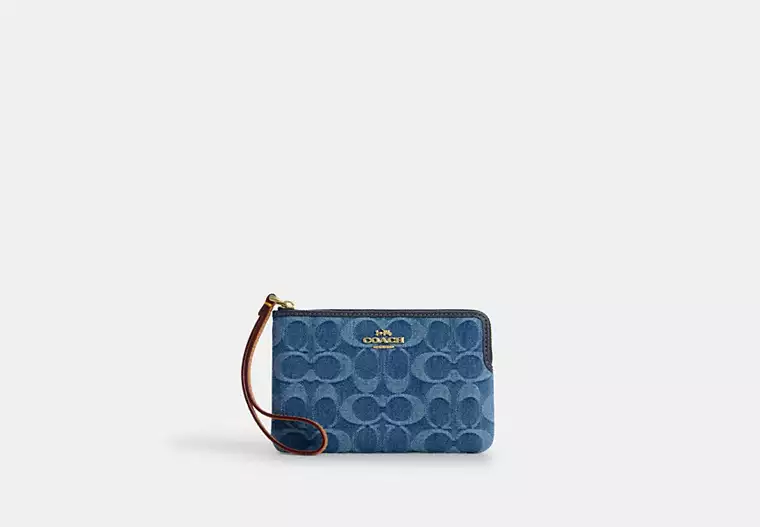 COACH Corner Zip Wristlet In Signature Denim