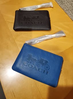Coach Wristlets available in several colors. Inbox me for mo