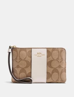 Coach Corner Zip Wristlet In Signature Canvas