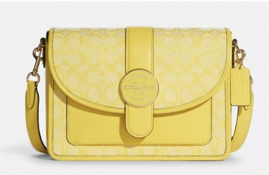 Spring is tomorrow! Splurge with this beautiful yellow COACH
