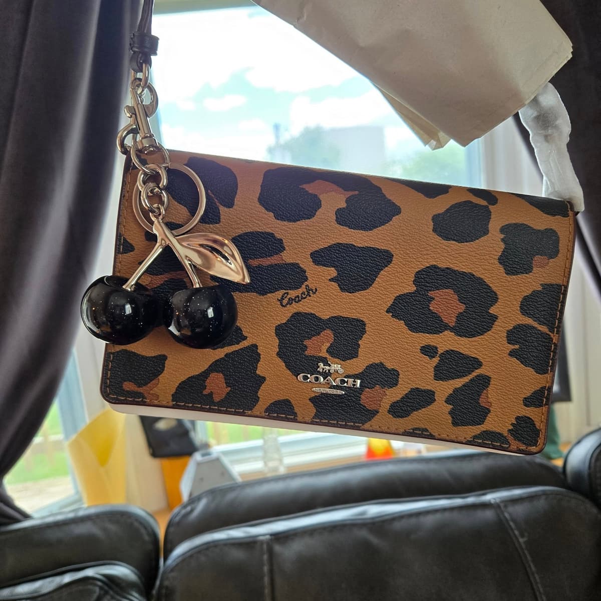 Beautifu Coach leopard print bag with Charm