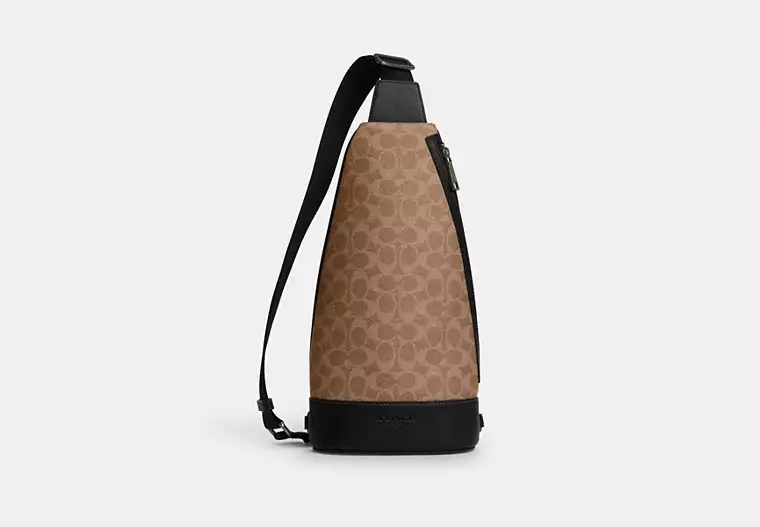 COACH Dominic Sling Pack In Signature Canvas