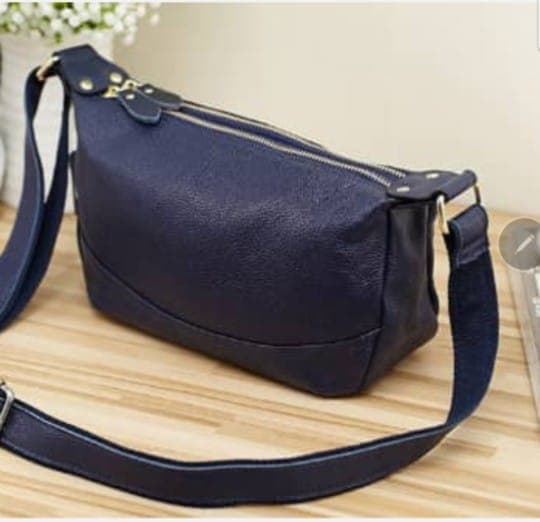 Nice black Genuine leather crossbody! Great Christmas presen