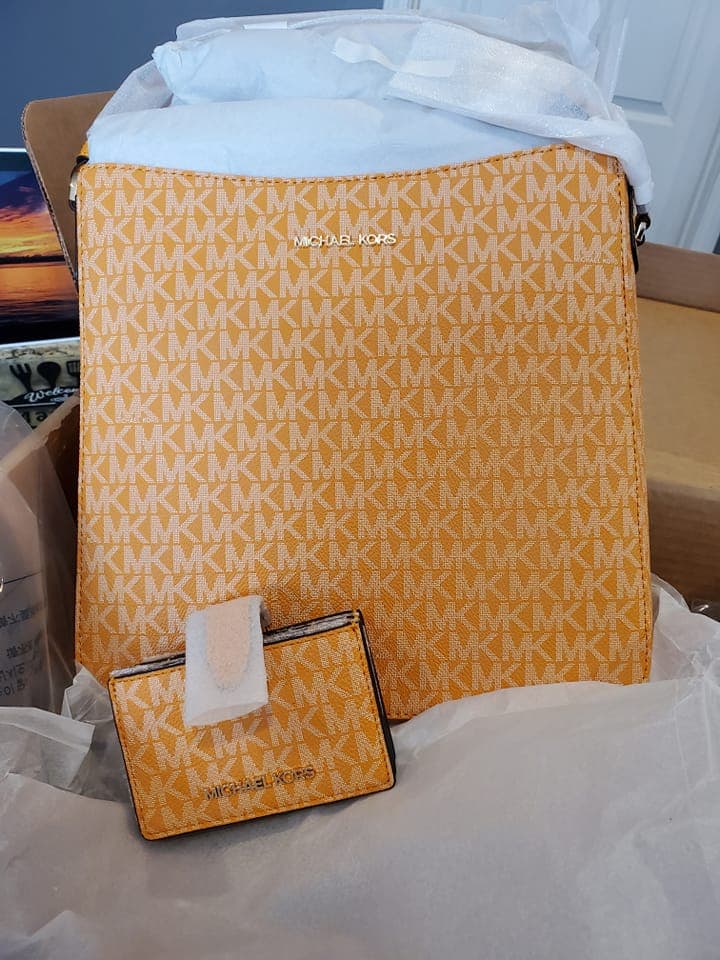 Bring in some sun with this Michael Kors Multi Comb Crossbod