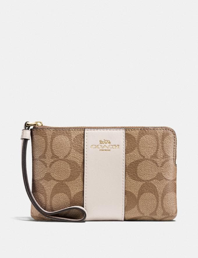 Coach Corner Zip Wristlet In Signature Canvas
