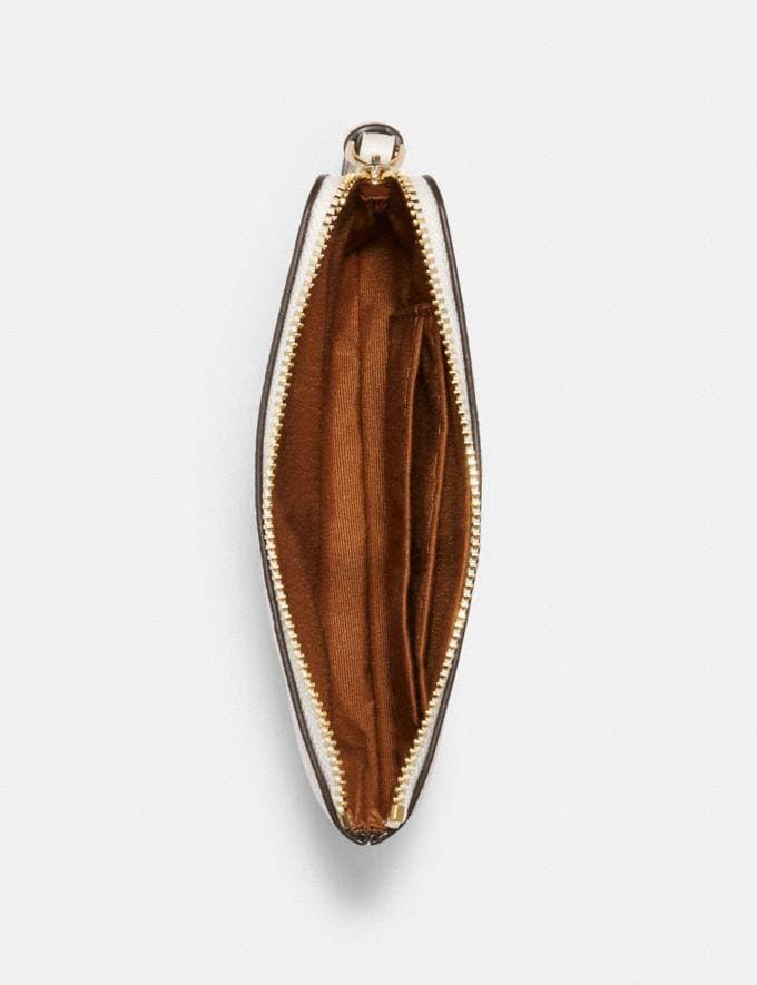 Coach Corner Zip Wristlet In Signature Canvas